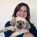 Sharon Miko holding a small dog